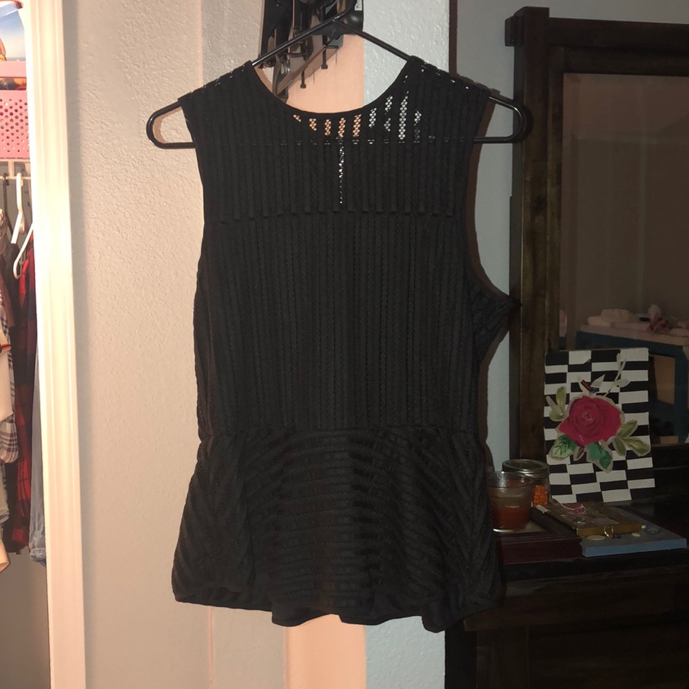 Black peplum top from anthropology